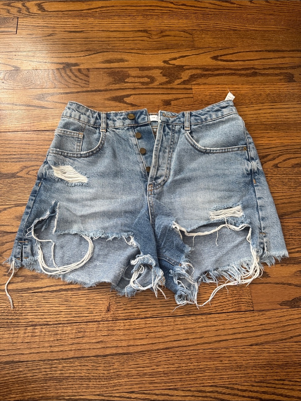 High-Rise Distressed Light Blue Denim Shorts